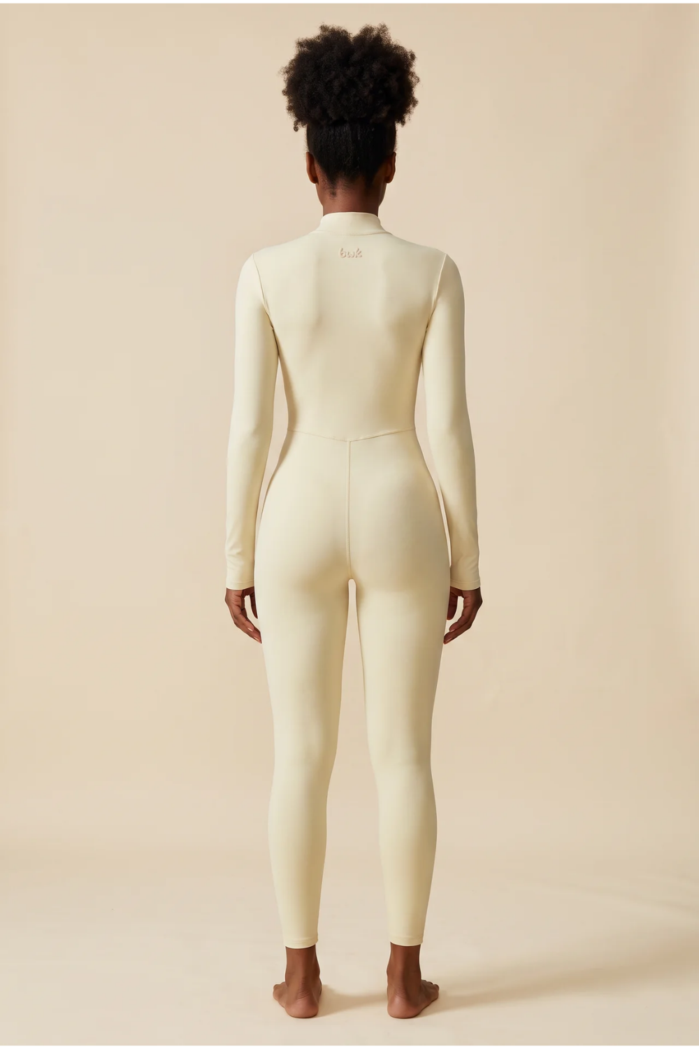 The Sculpt Zip Onesie Cream
