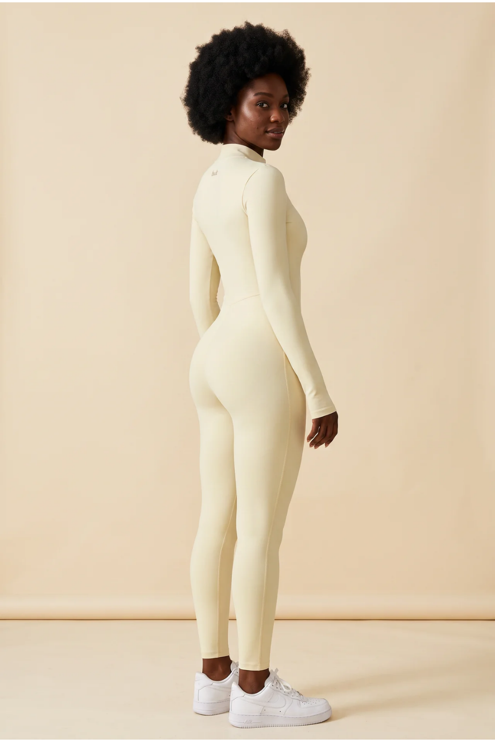 The Sculpt Zip Onesie Cream